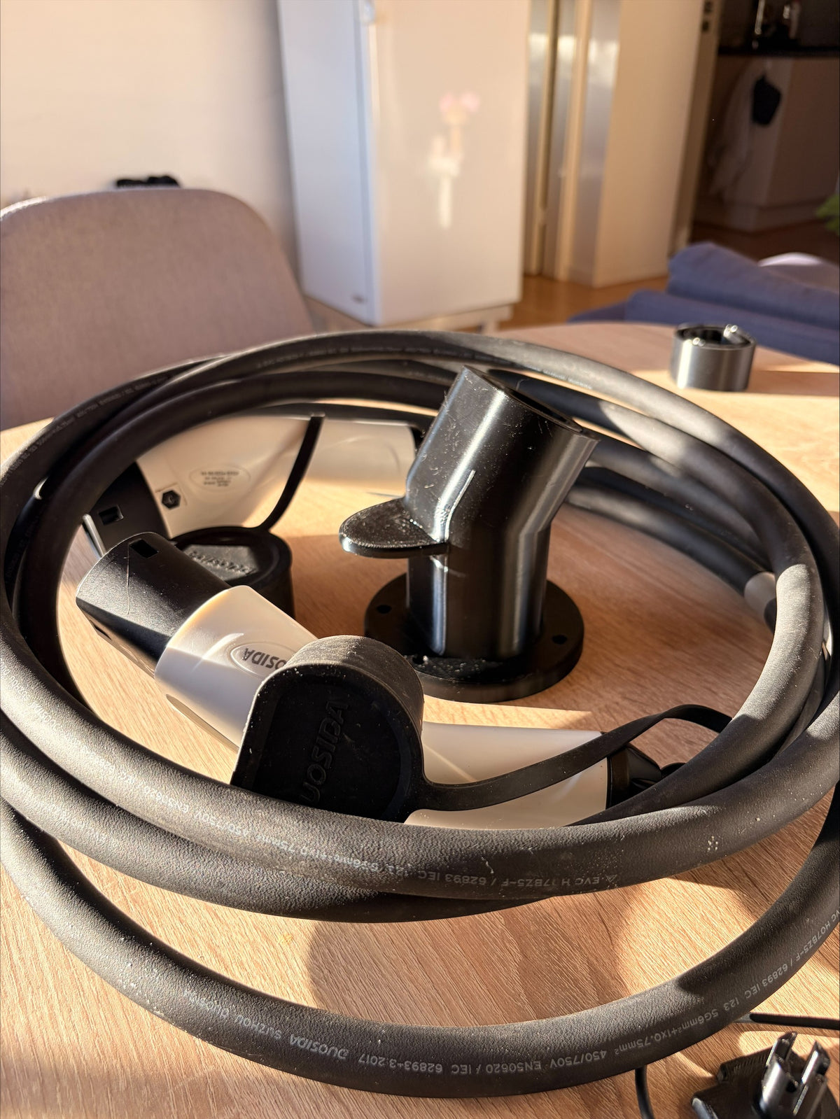 Lade kabel holder